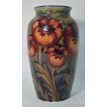 A William Moorcroft vase decorated with the 'Big Poppy' pattern