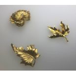 Three vintage gilt metal brooches