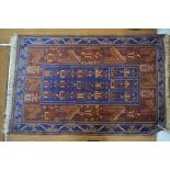 A Belouch rug, blue/brown ground