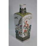 A Chinese famille rose vase painted with birds and insects in rocky landscapes, late Qing