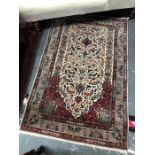 A fine Persian part silk rug