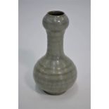 A small Chinese Song style longquan celadon garlic mouth bottle vase