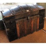 A Victorian oak and metal bound dome topped trunk