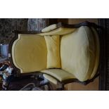 A late 19th century German oak framed leather upholstered salon armchair