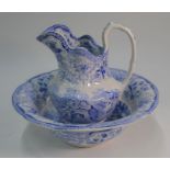 A 19th century blue and white transfer printed washbowl and ewer