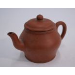 A small Chinese Yixing teapot