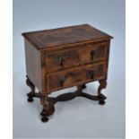 A William and Mary style two drawer miniature chest on stand