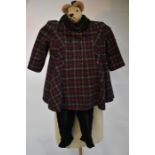 A child's tartan wool coat and green velvet trews and a blue velvet cape