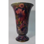 A large and impressive William Moorcroft pedestal vase decorated with the 'Spanish' pa