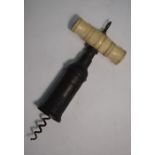 A 19th century R Jones Patent Thomason-type corkscrew with turned bone handle