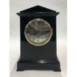 A WWII period vaulted and ebonised mantle clock, the eight day movement No.19370 by W Elliot 1942