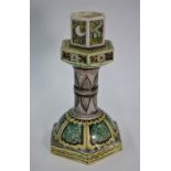 A 19th century Ottoman pottery candle stick painted with polychrome enamels