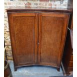 A Victorian mahogany inverted bow-fronted cabinet