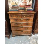 n 18th century oak chest of two short over four long graduated drawers