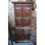 An antique rosewood cabinet, probably Portuguese