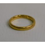 A 22ct yellow gold wedding band