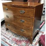 A 19th century mahogany bowfront chest of three long graduated drawers