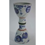 A late 19th or early 20th century Japanese porcelain stemmed vase