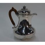 Paul Storr - A George IV silver pear-shaped hot water jug