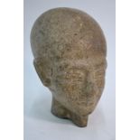 An Egyptian Amarna-style carved stone head, 20 cm high