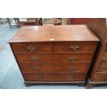 A George III mahogany chest of two short over three long graduated drawers