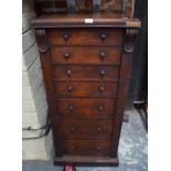 A Victorian mahogany Wellington 'secretaire' chest of five drawers and a double dummy-drawer front f