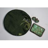 A Chinese green jade brooch to/w a pair of cabochon earrings