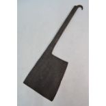 An antique large and heavy wrought iron cleaver, 65 cm long