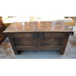 A 17th century lunette carved English oak coffer