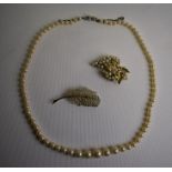 A single row of graduated cultured pearls and other pearl set items