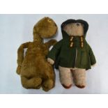 A plush top ET and Paddington-style teddy bear