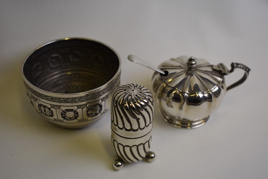 A Victorian chased silver sugar basin etc.