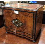 An inlaid ebony cross-banded Amboyna decanter box