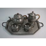 A 'Tudric' planished pewter four piece tea service