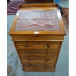 A Victorian rosewood Davenport, the rotating slope top over four graduated drawers