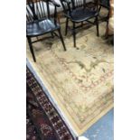 A handmade Polonaise carpet, the flat woven stylized floral design on ochre-yellow ground, 291 x 22