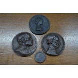 Three Continental relief bronze plaques