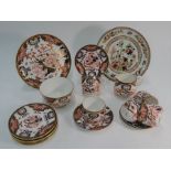 A Royal Crown Derby Imari decorated part tea service