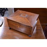 A 19th century boxwood and mahogany work box,