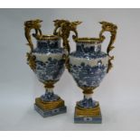 A fine quality pair of modern blue and white Chinoiserie-painted baluster garniture vases