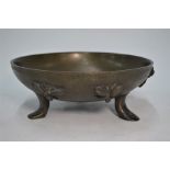 An Art Deco cast bronze bowl with applied relief hornet motifs
