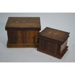 Two Jerusalem olive wood puzzle boxes as stacks of books