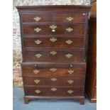 A George III mahogany chest on chest, the moulded cornice over two short and three long drawers