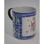 A 19th century Chinese export famille rose and underglaze blue tankard, late Qing dynasty