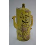 A Chinese famille rose yellow ground ewer