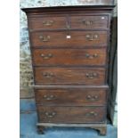 A George III mahogany chest on chest the two short over five long graduated drawers