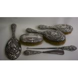 Three silver-backed hairbrushes etc.