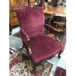 An 18th/19th century walnut Chippendale design Gainsborough library armchair