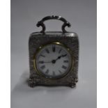 A late Victorian silver boudoir clock