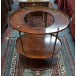 A 19th century campaign washstand, the three ovoid mahogany tiers each with a 3/4 brass gallery